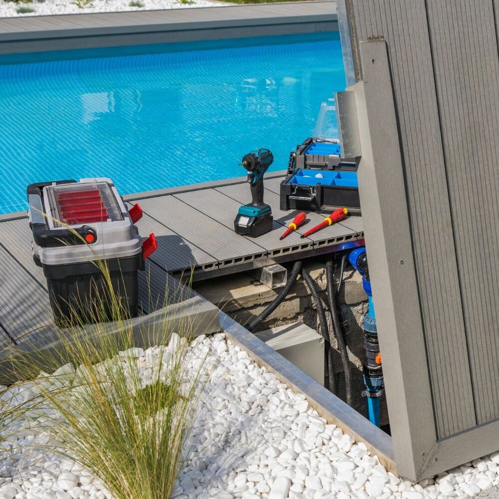 Updated pool heater and filtration system at an Akron residential pool.