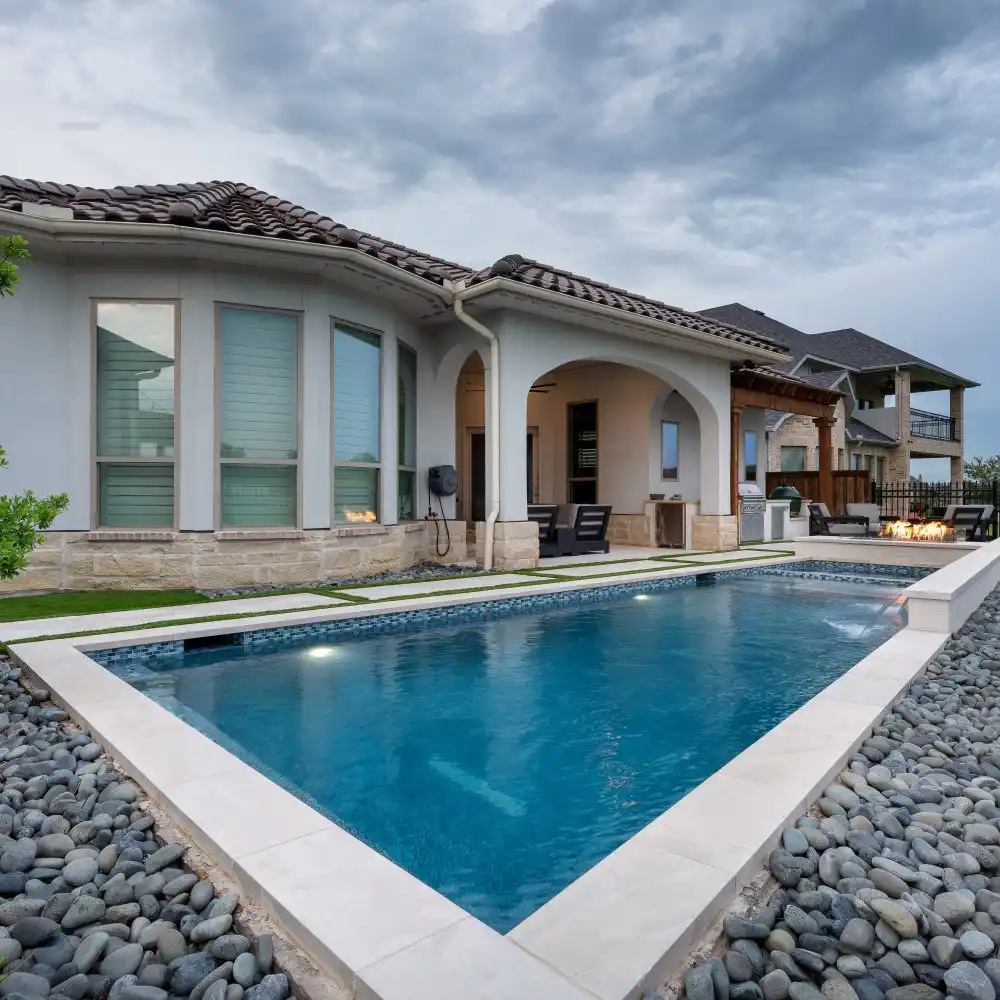 Newly remodeled pool with fresh plaster and modern design in a Cleveland backyard.